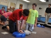 Performing CPR on dummy at Algoma Christian